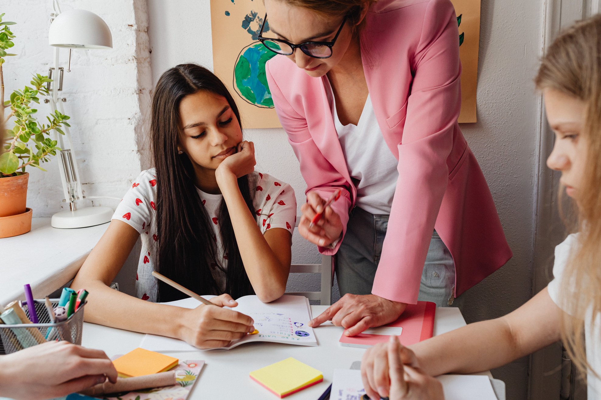 A Woman Teaching Her Students