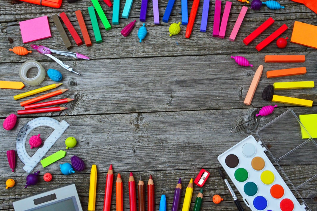 School Supplies on Wooden Background